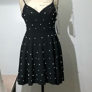 Elegant Black Dress with Pearl Accents